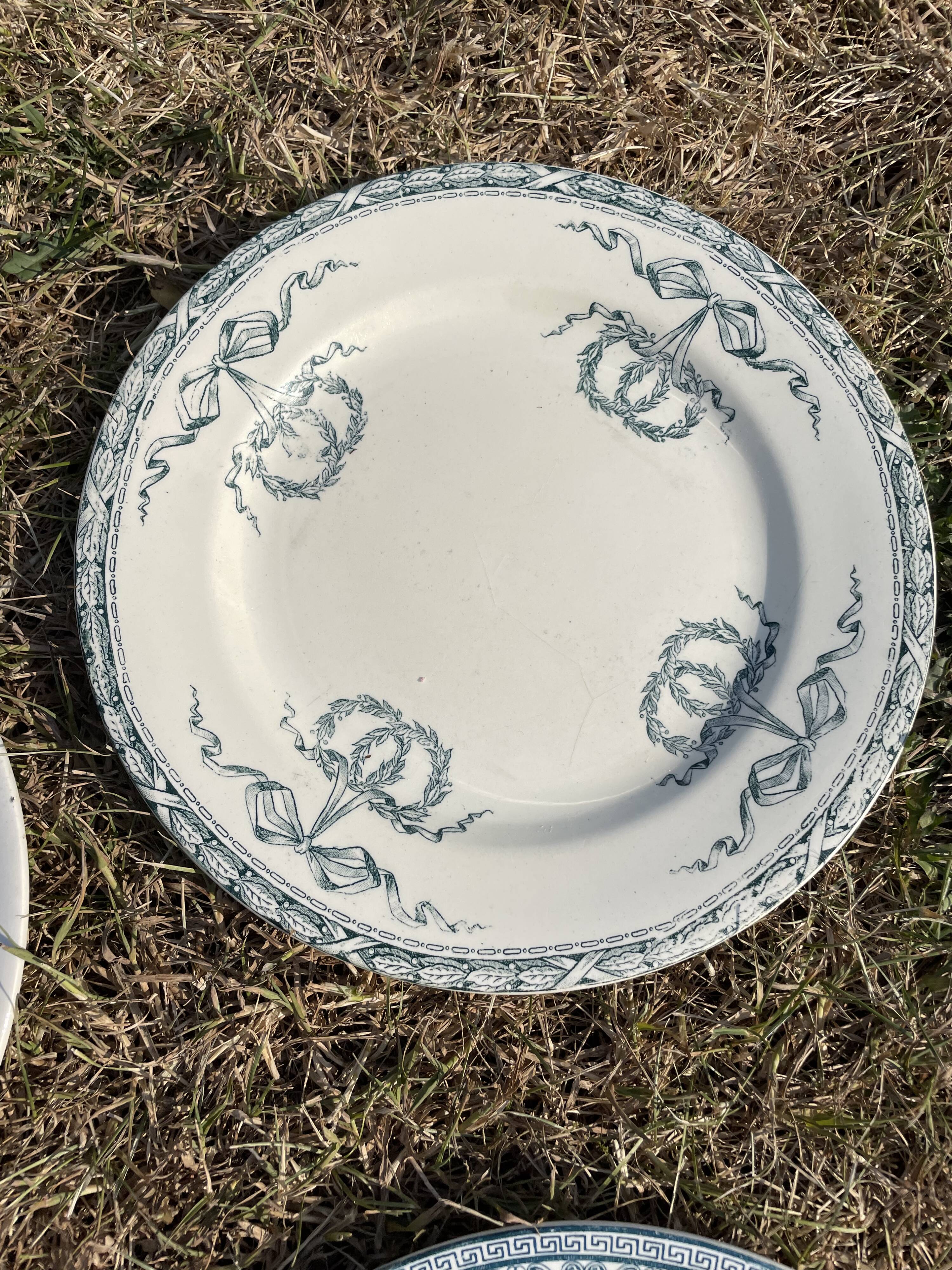 Set of 8 mismatched iron earth flat plates