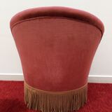 Toad in powder pink velvet armchair