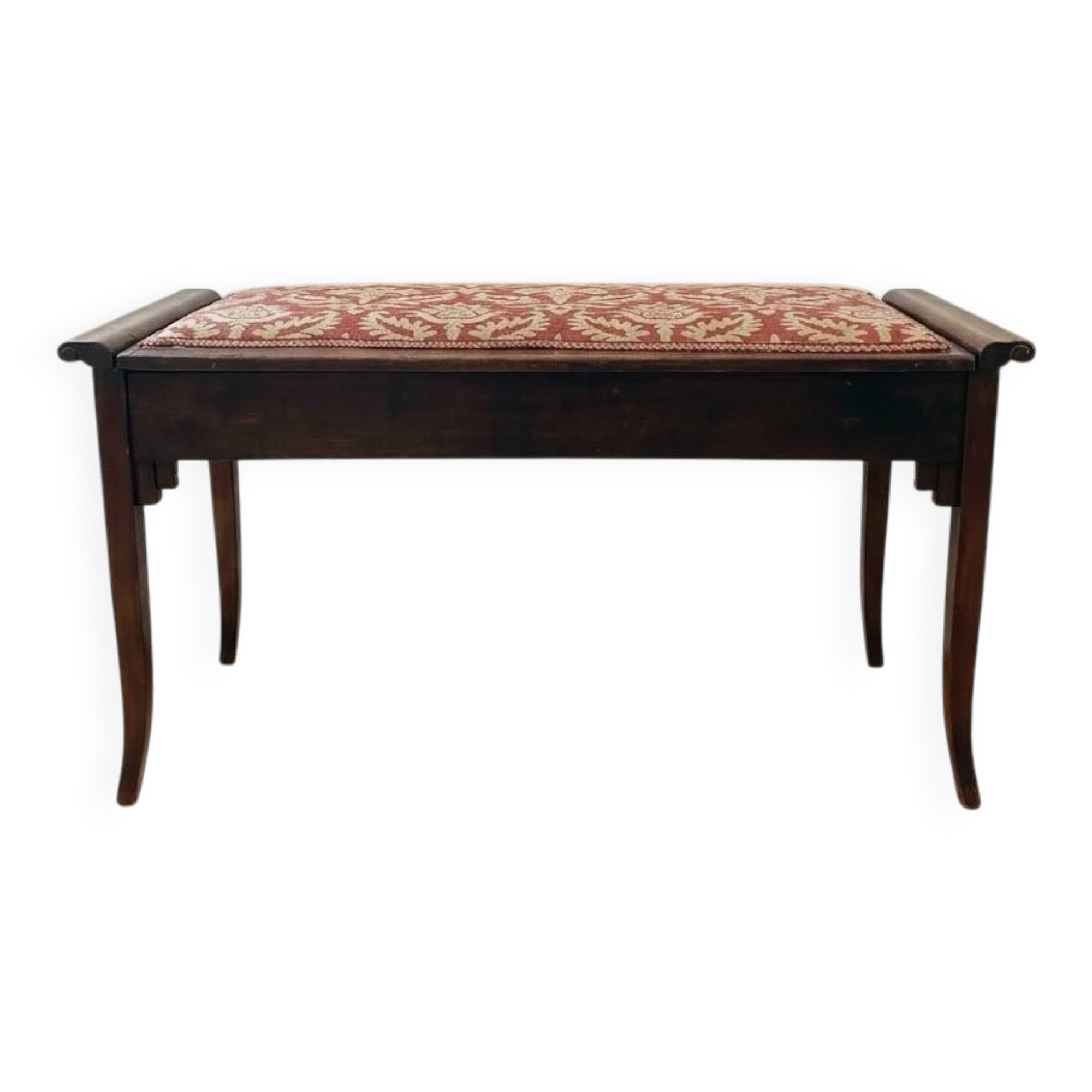 Antique wooden storage bench with red fabric.