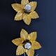 Paire d'appliques feuilles dorées
