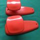 Pair of Patère coat rack Syla France plastic orange design 70s