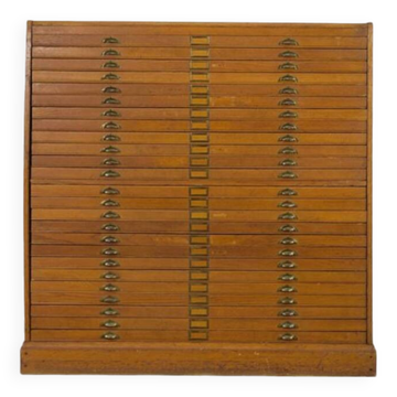 Vintage industrial oak filing cabinet with several drawers, 1930s.