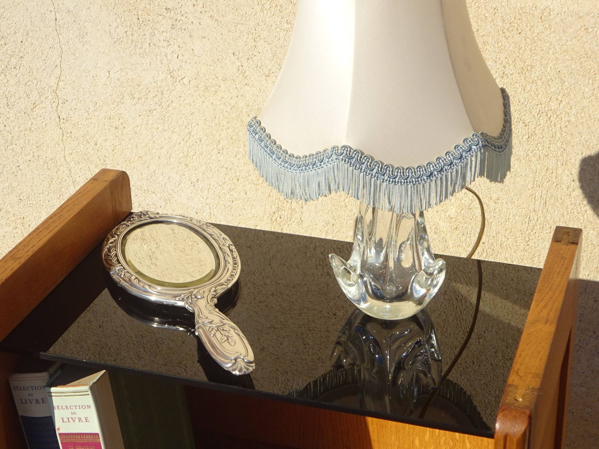 Vintage oak bedside table with tapered legs.