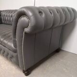 Gray leather Chesterfield sofa