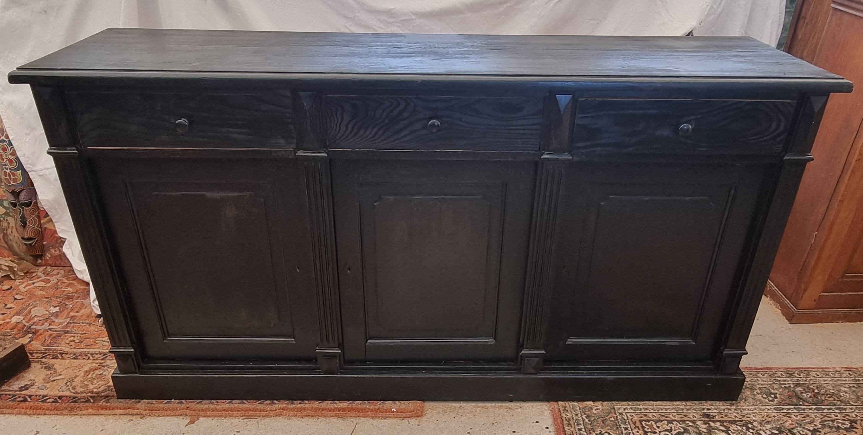 Black patinated chest of drawers