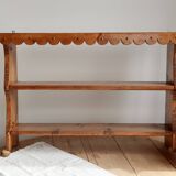 Vintage pine wall shelf with a scalloped front.