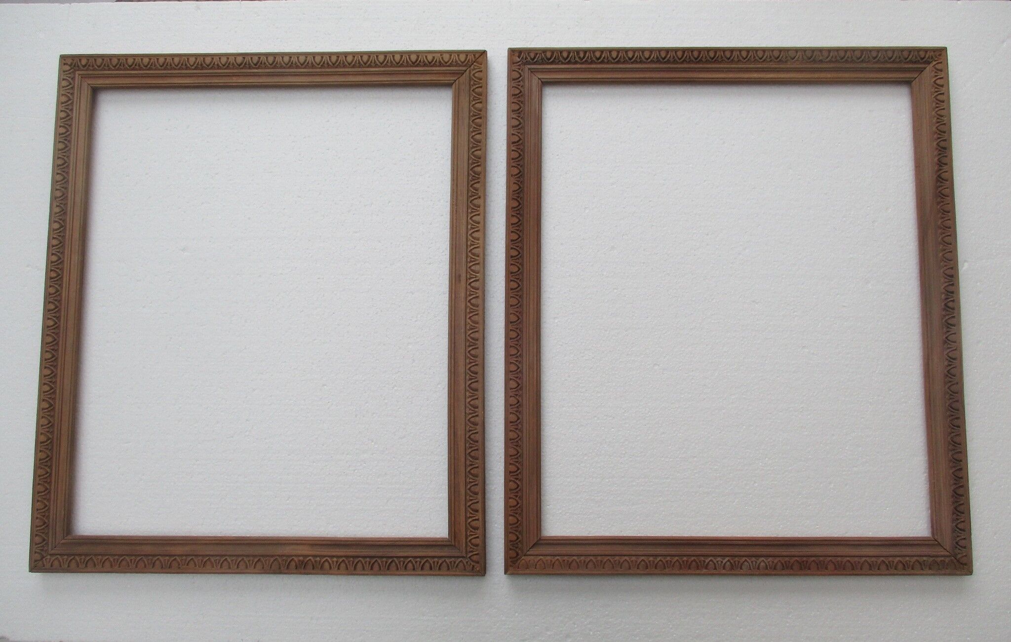 Pair of old wooden frames, oves decoration