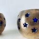 Pair of brass and glass tealight holders