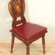 Set of 6 Italian Renaissance style chairs in solid walnut, finely carved.