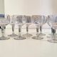 9 verres à vin guillochés déb. XXème
