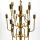 Three staged 18 arm Mid Century brass chandelier with a long brass rod