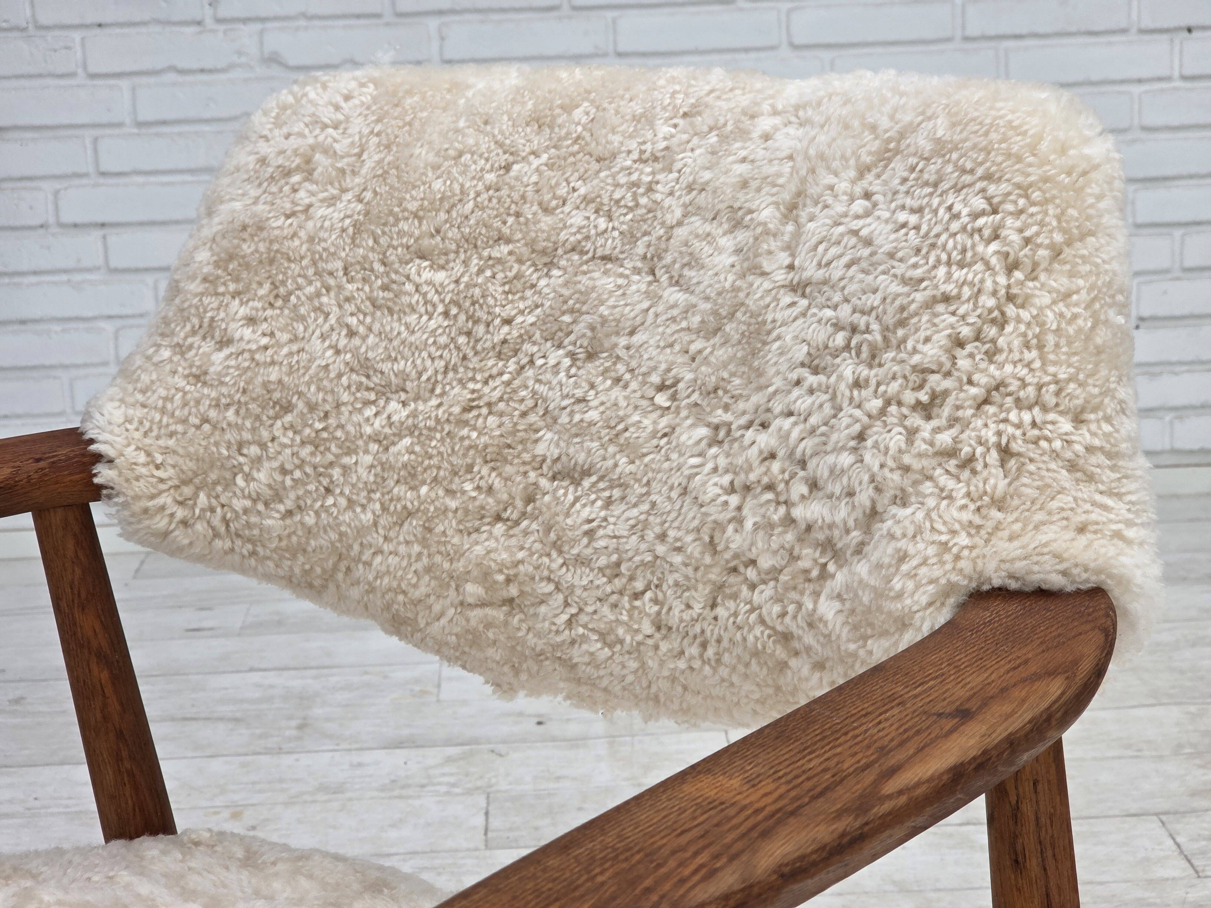 1960s, Danish design by Erik Kirkegaard, model 43, genuine sheepskin.