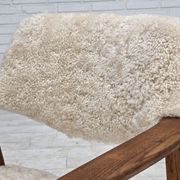 1960s, Danish design by Erik Kirkegaard, model 43, genuine sheepskin.