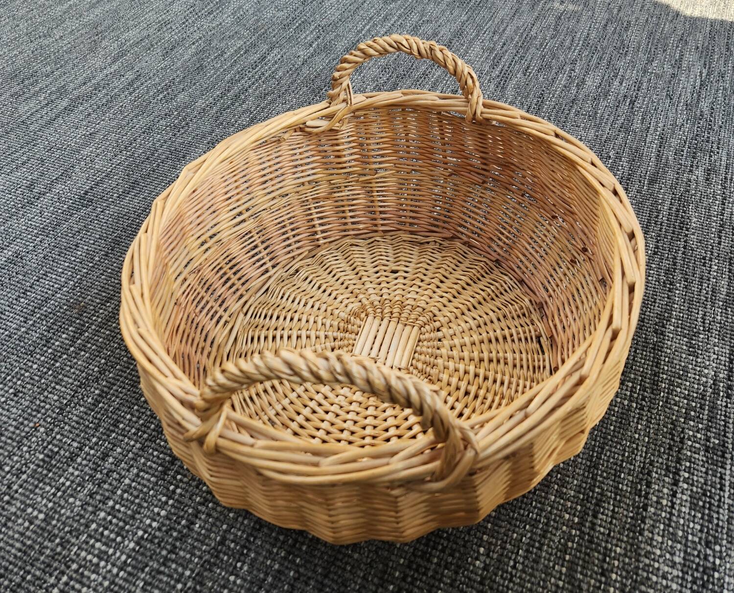 Large round wicker basket with handles
