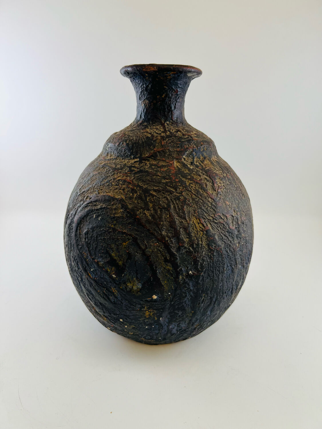 Iridescent black ball vase