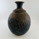 Vase boule noir irisé