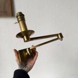 Pair of brass wall lights with articulated arms from the 70s