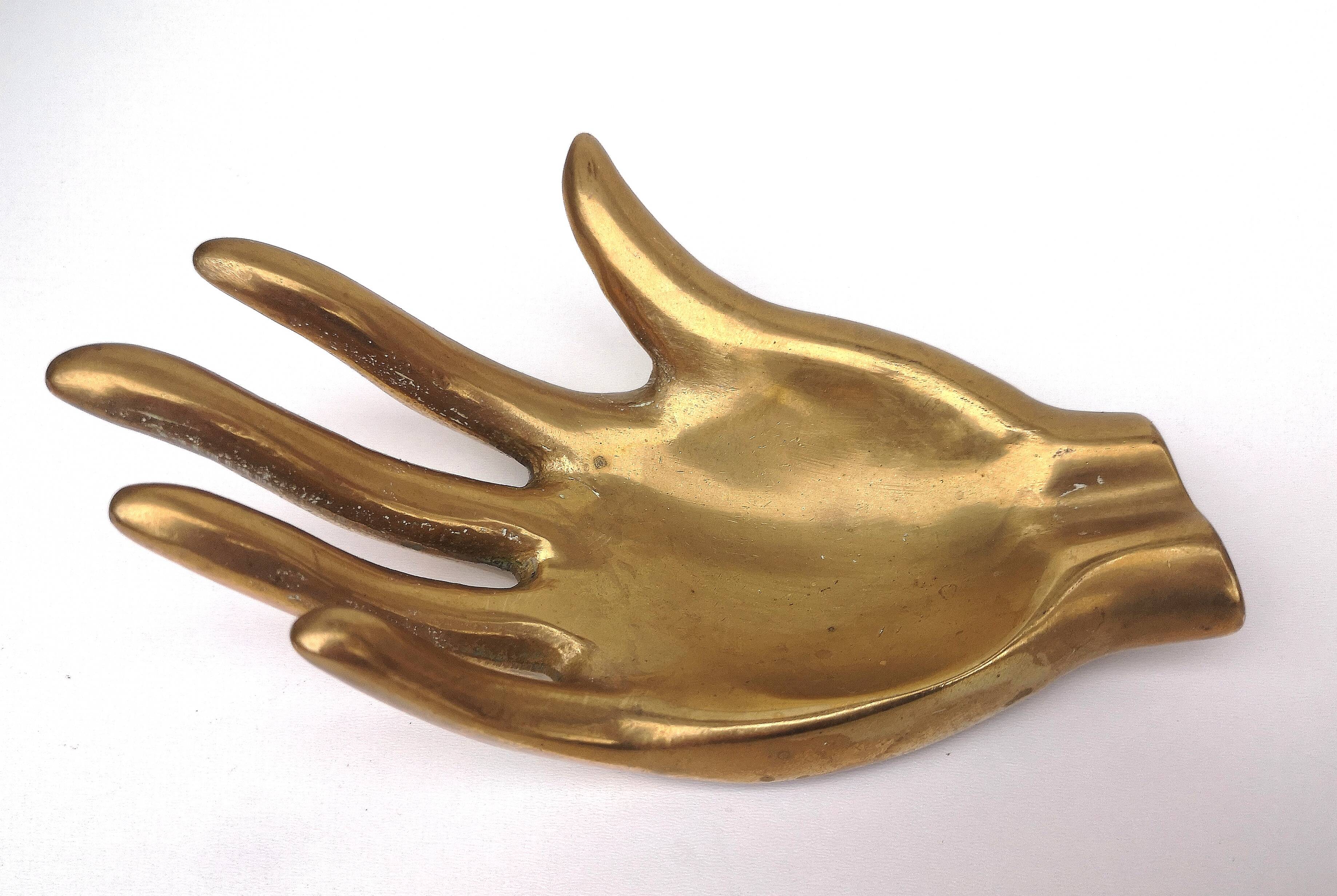 Hand, vintage ashtray, bronze