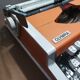 Olympia traveller luxury typewriter orange revised and new ribbon