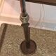 Imposing pair of lamps in Burgundy stone and brass art deco period