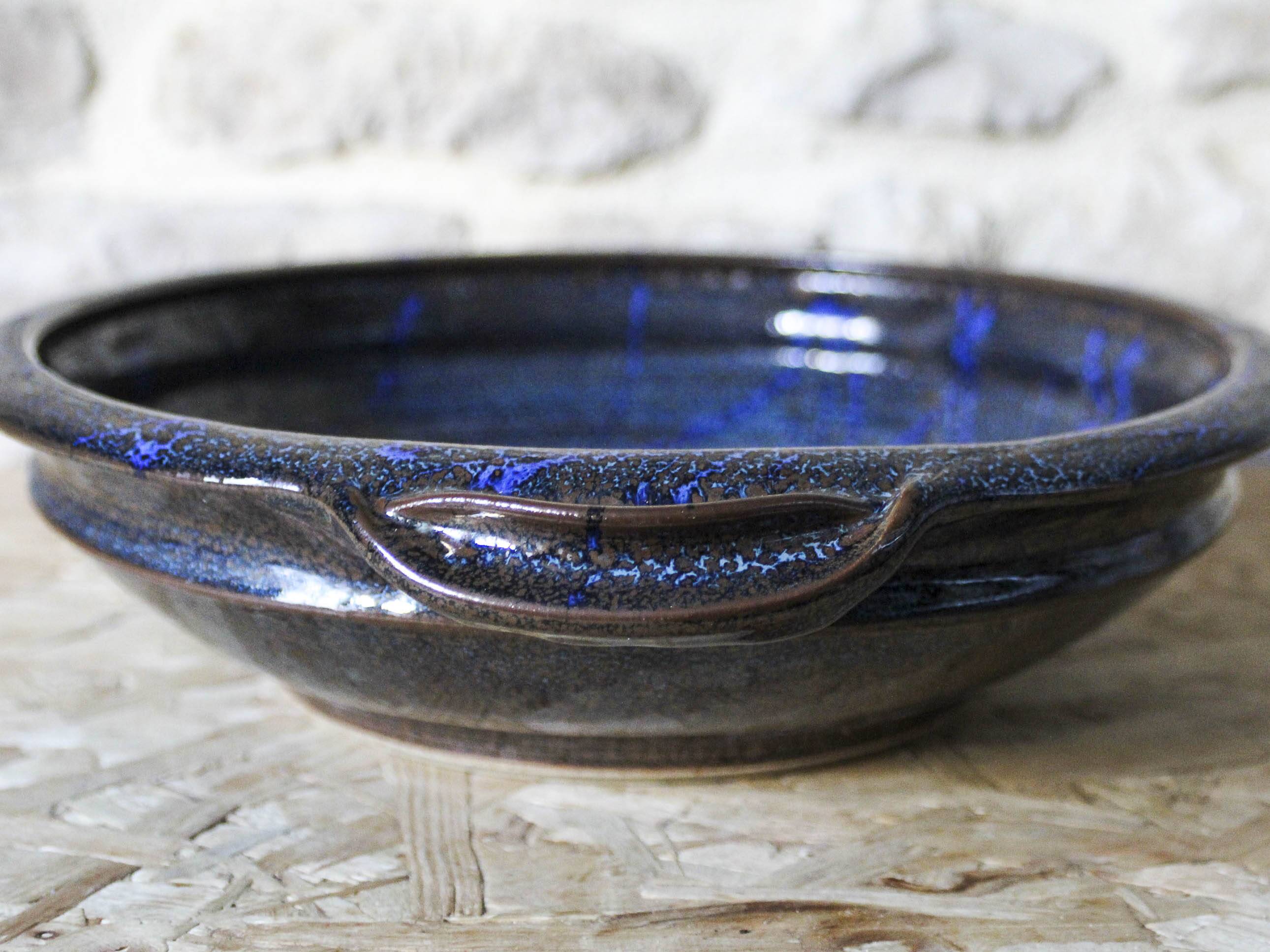 Enamelled ceramic hollow dish signed