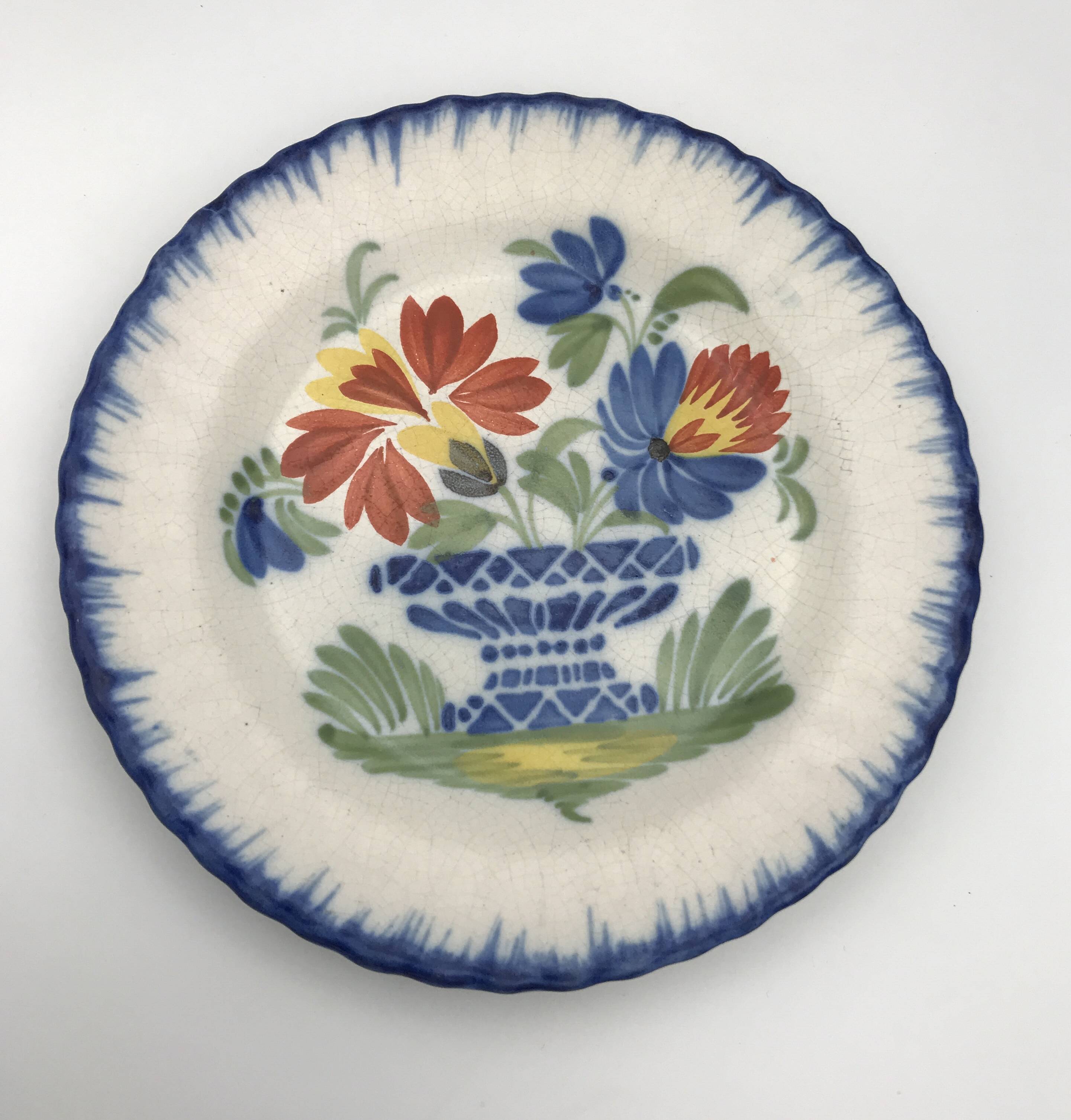 Antique auvillar earthenware plate decorated with basket of polychrome flowers