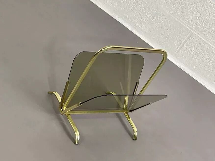 Vintage magazine rack in smoked glass and brass.
