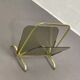 Vintage magazine rack in smoked glass and brass.