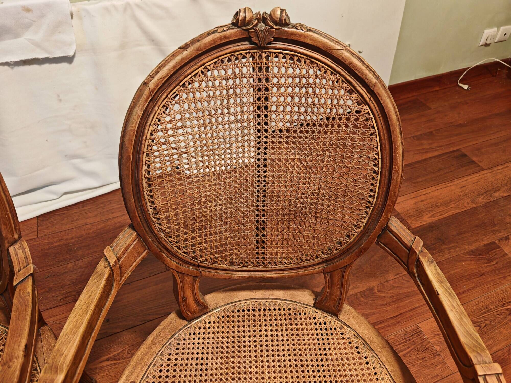 Caned armchairs