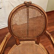 Caned armchairs