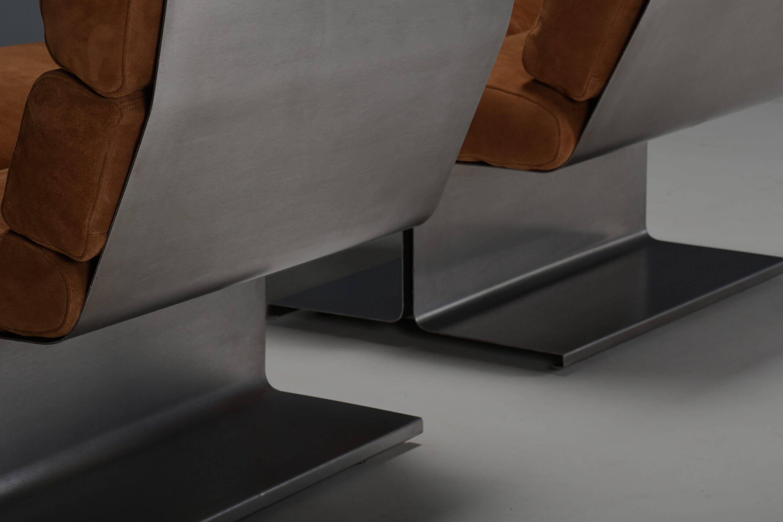 Very rare pair of leather and steel lounge chairs by Paul Geoffroy for Uginox