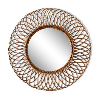 Sun mirror in woven rattan