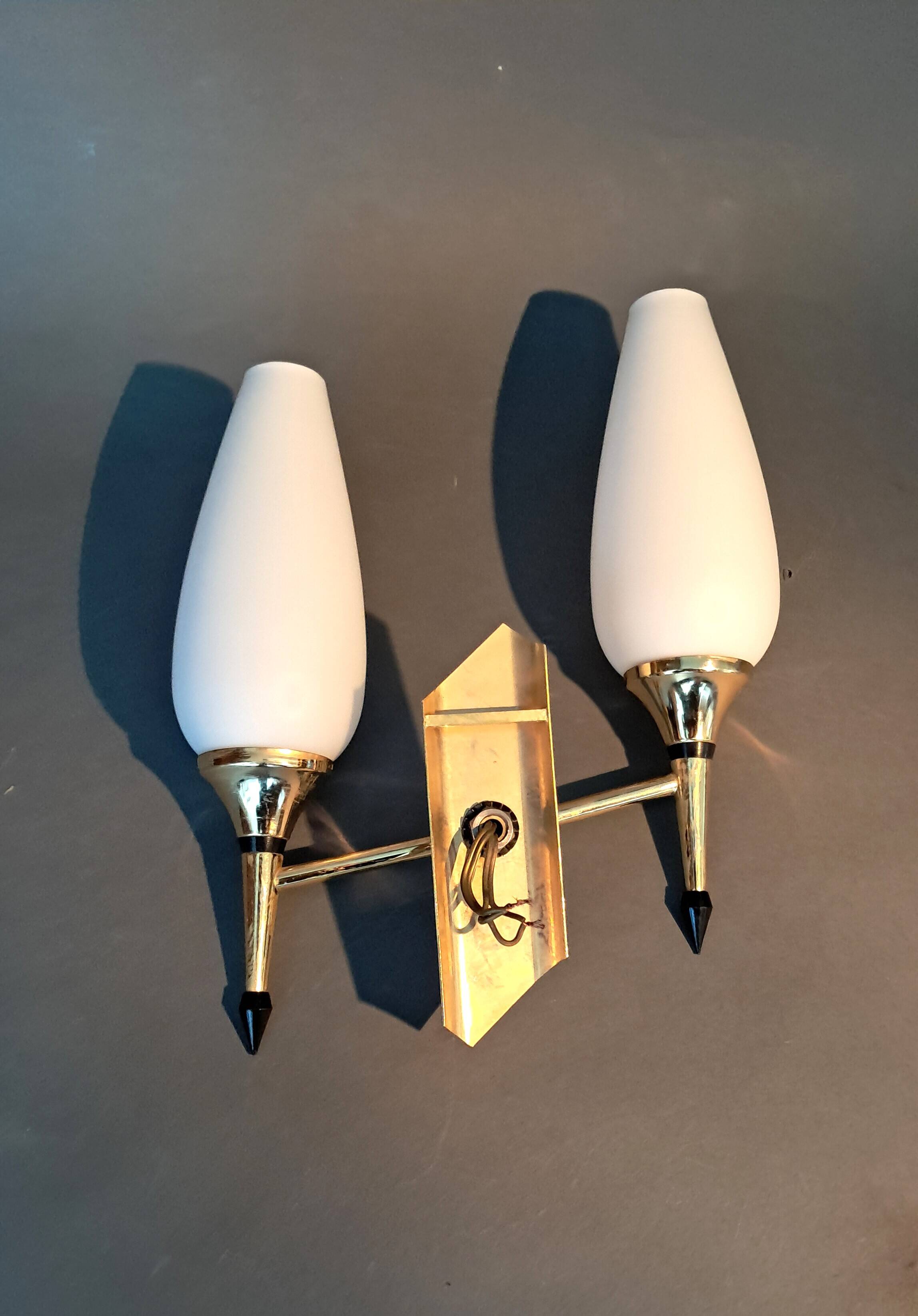 Small two-light wall lamp, white opaline and gilded brass, Circa 1960.
