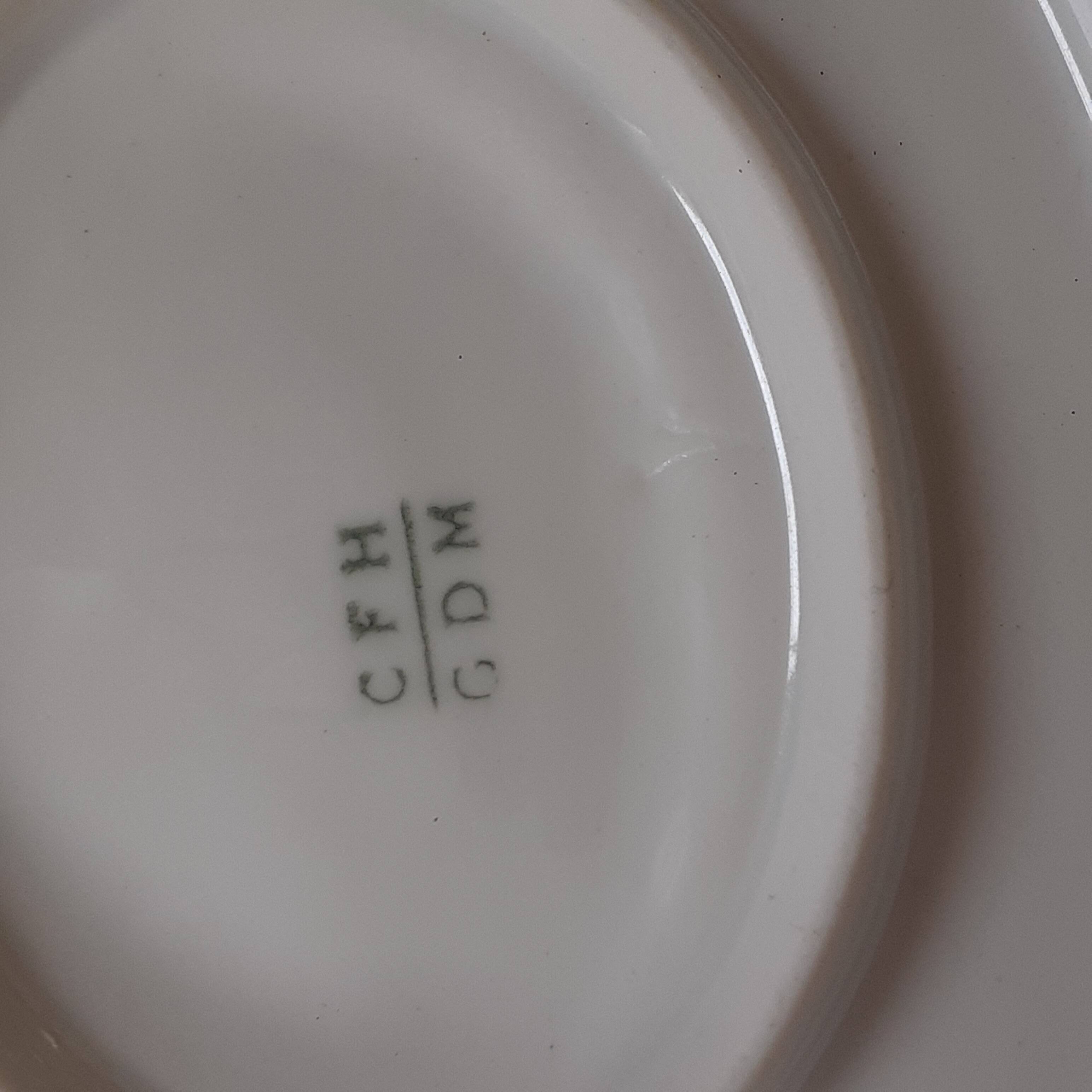 Saucière early twentieth century. Haviland. Limoges.Floral motif, hand painted.