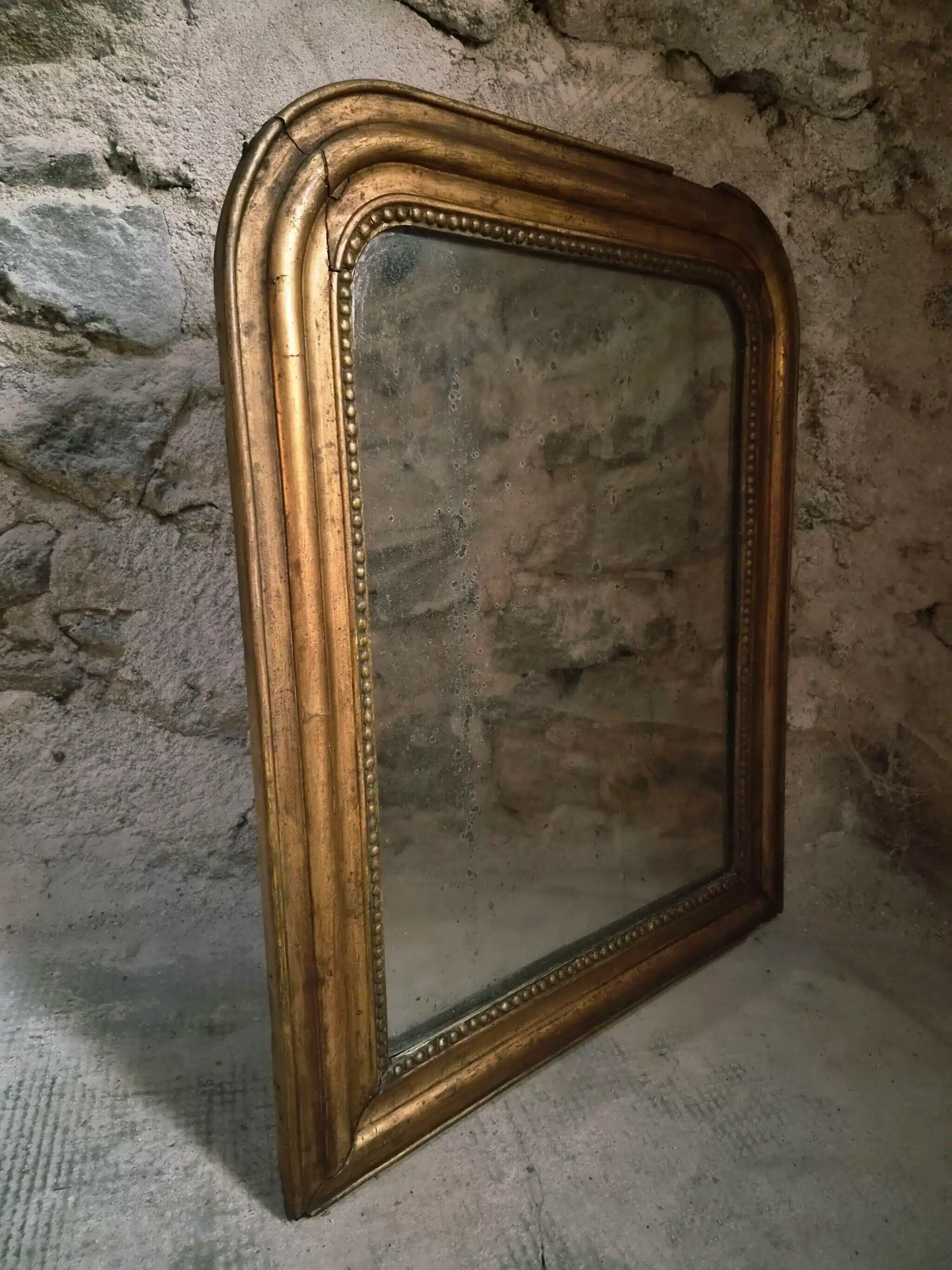 Antique French Louis Philippe mirror, gilded mercury mirror, 19th century.