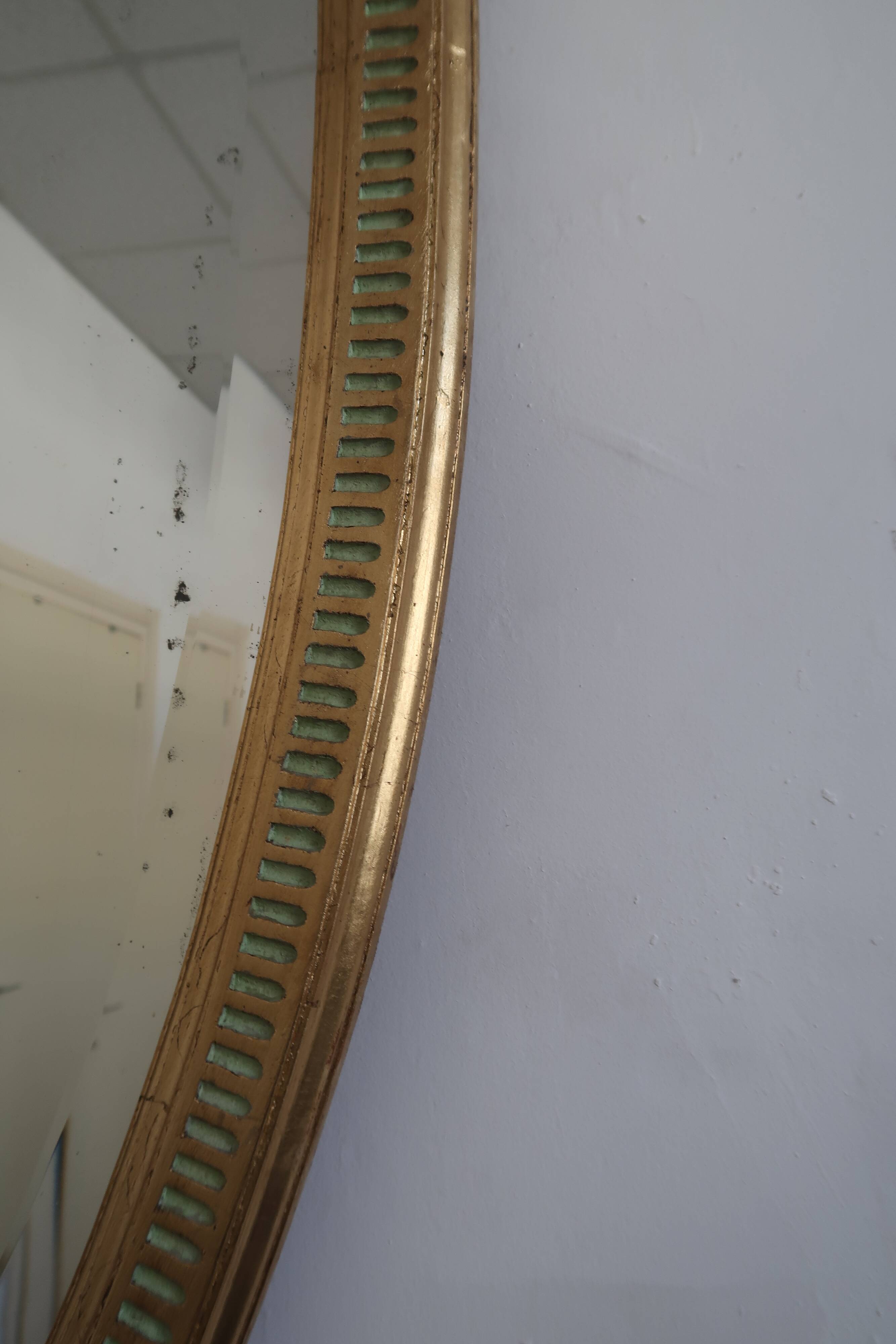 Empire style oval mirror