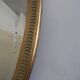 Empire style oval mirror