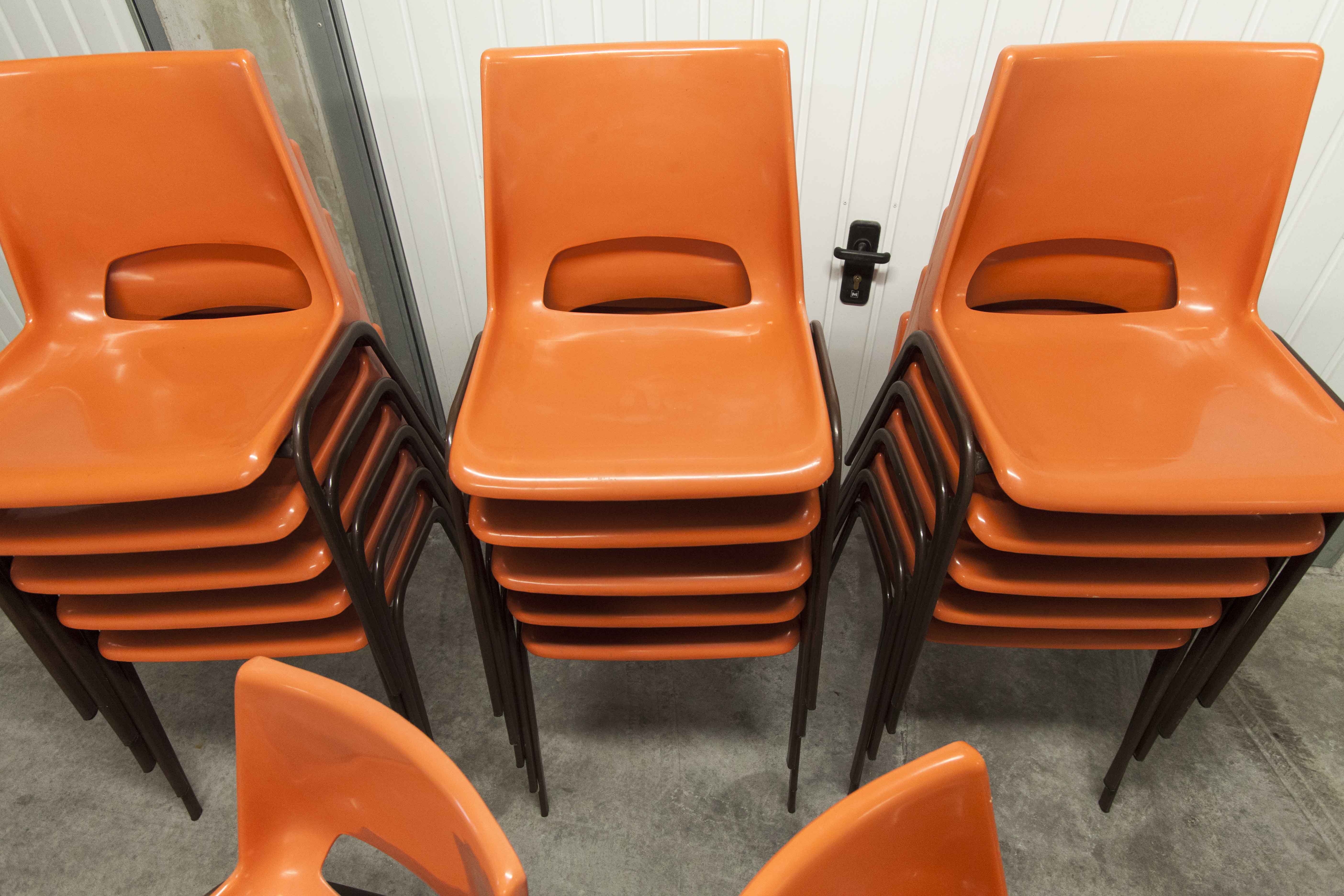 Set of 17 vintage orange chairs 1970