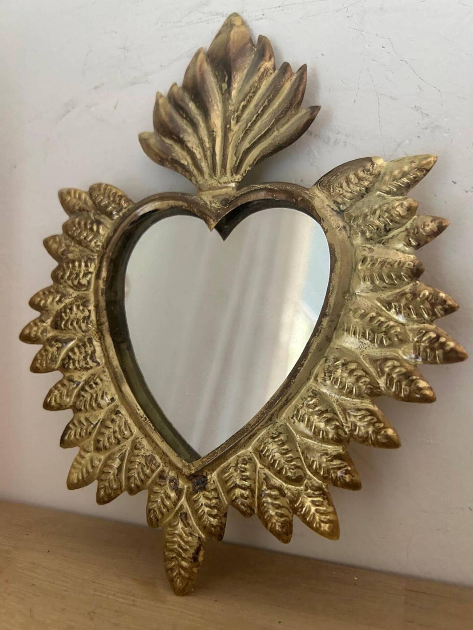 Golden ex-voto wall heart