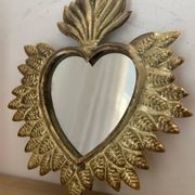 Golden ex-voto wall heart