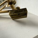Pair of brass wall lights with articulated arms from the 70s