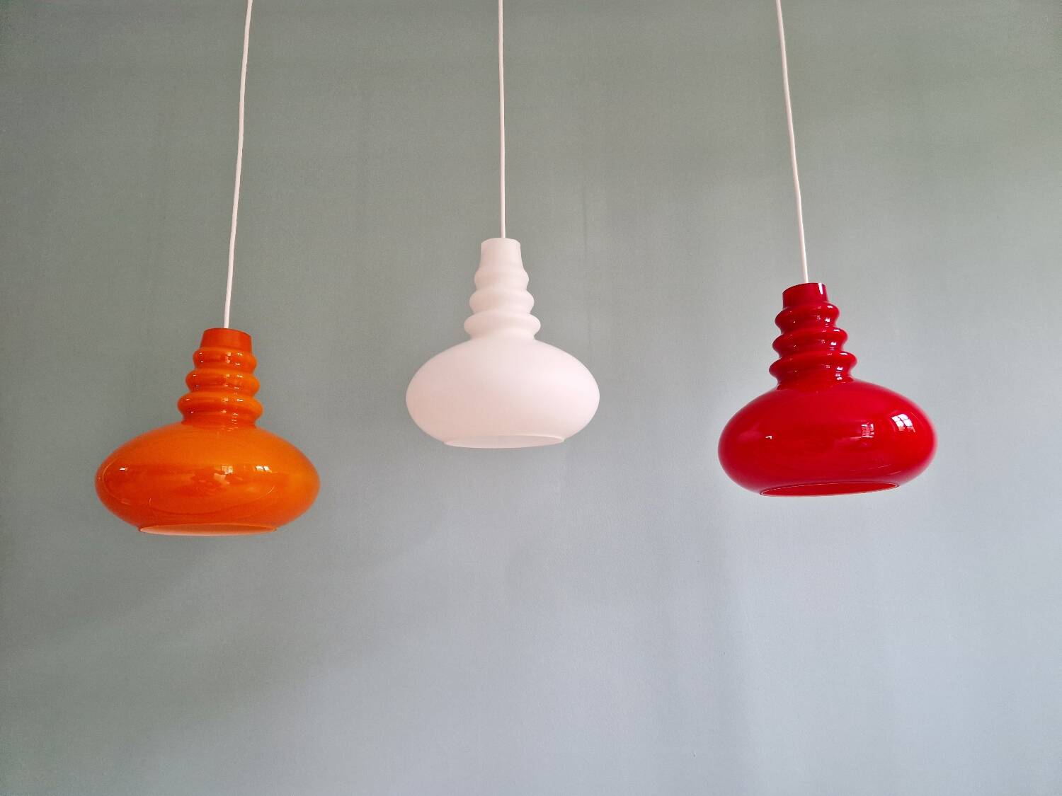 Trio of Space Age opaline pendant lights, Peill & Putzler, 1970
