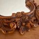 Carved wooden mirror