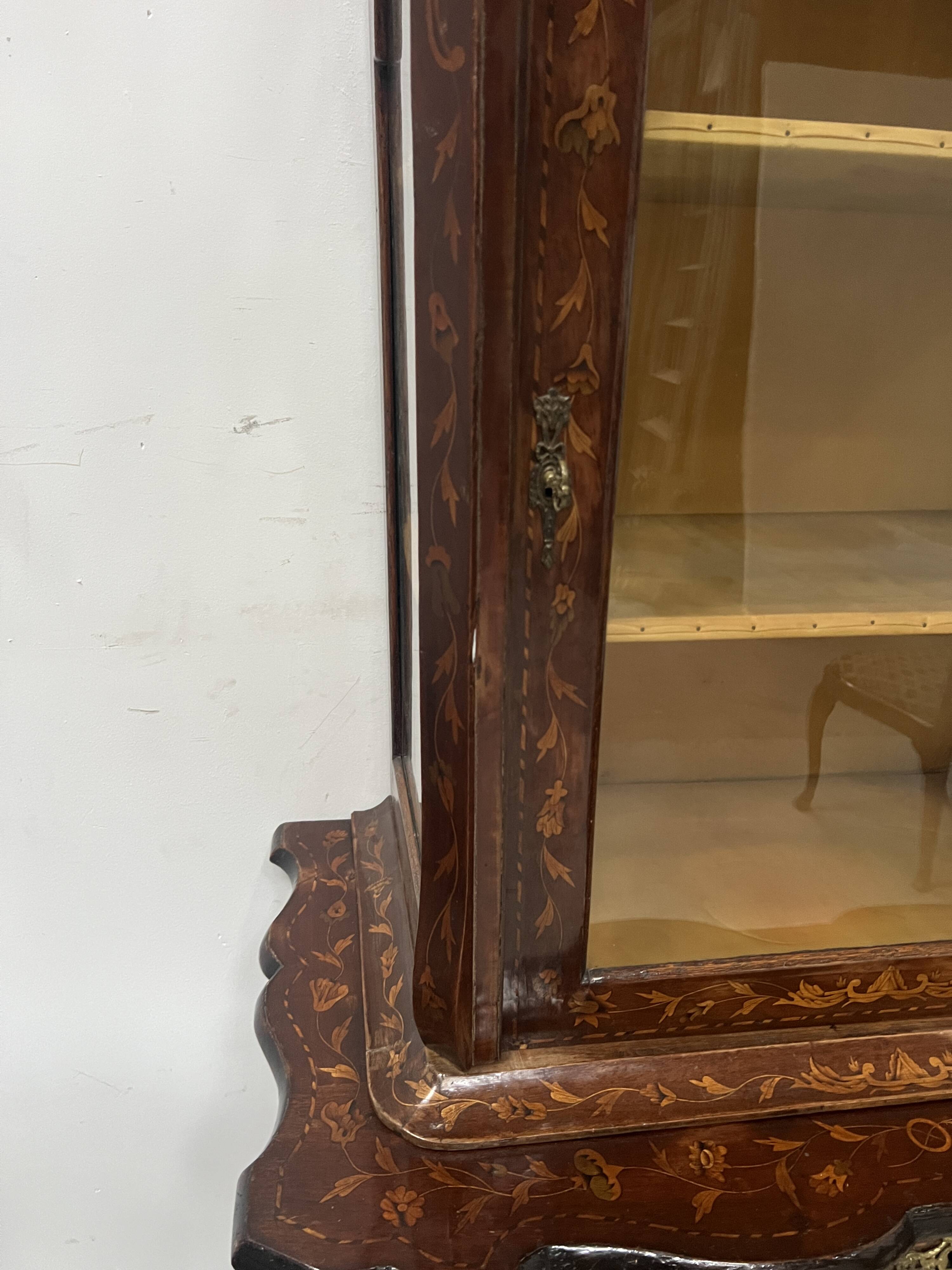 Dutch display cabinet in two parts made of marquetry wood.