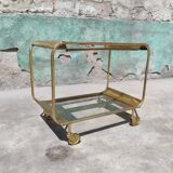 Old rolling coffee table serving vintage brass bar 50s mid-century design