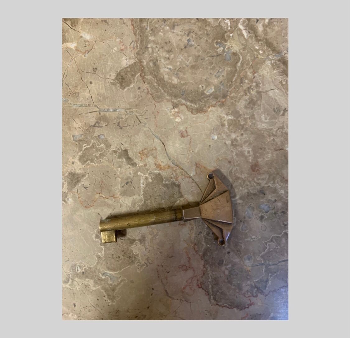 Black art deco sideboard and grey marble