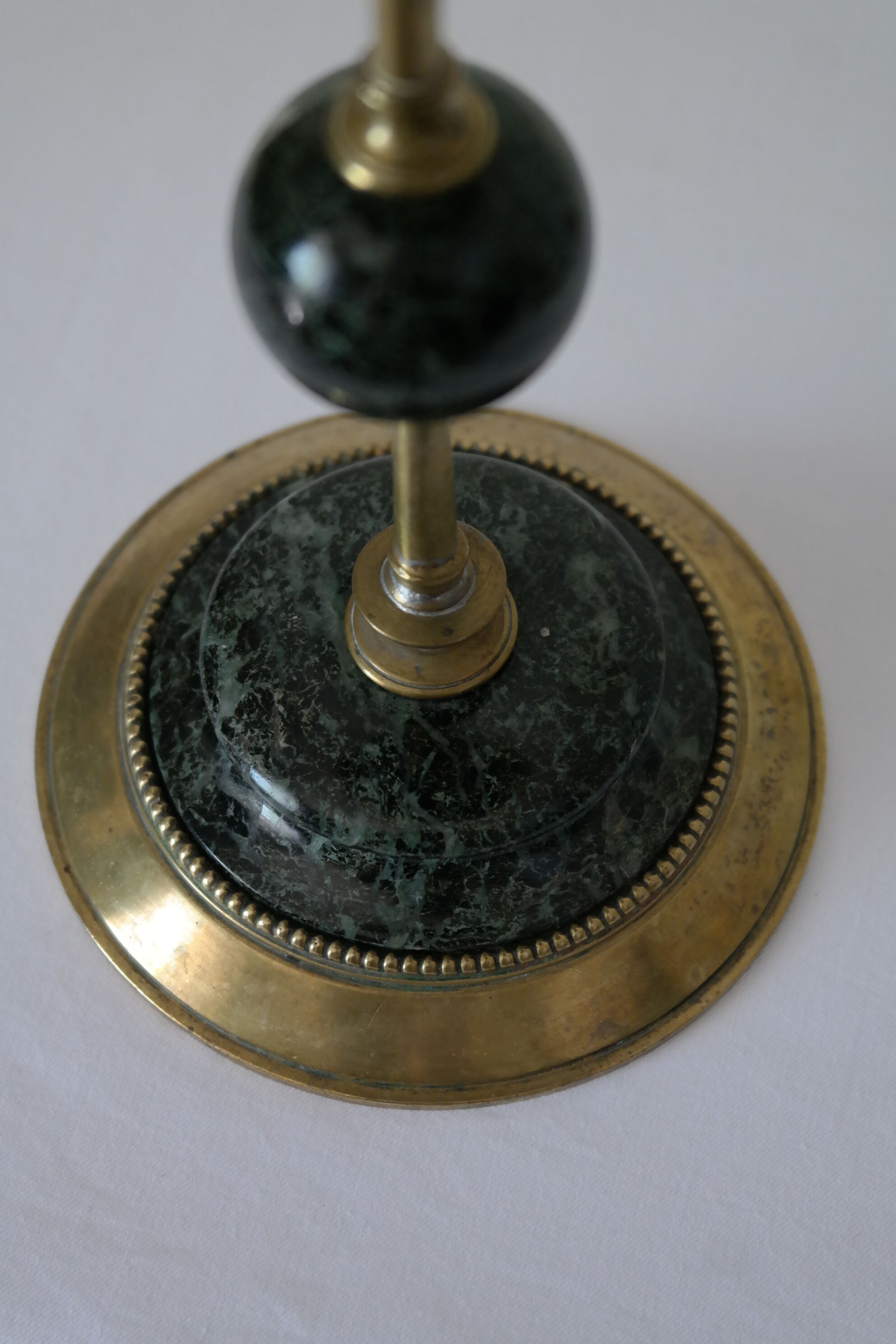 Brass and green marble candlestick