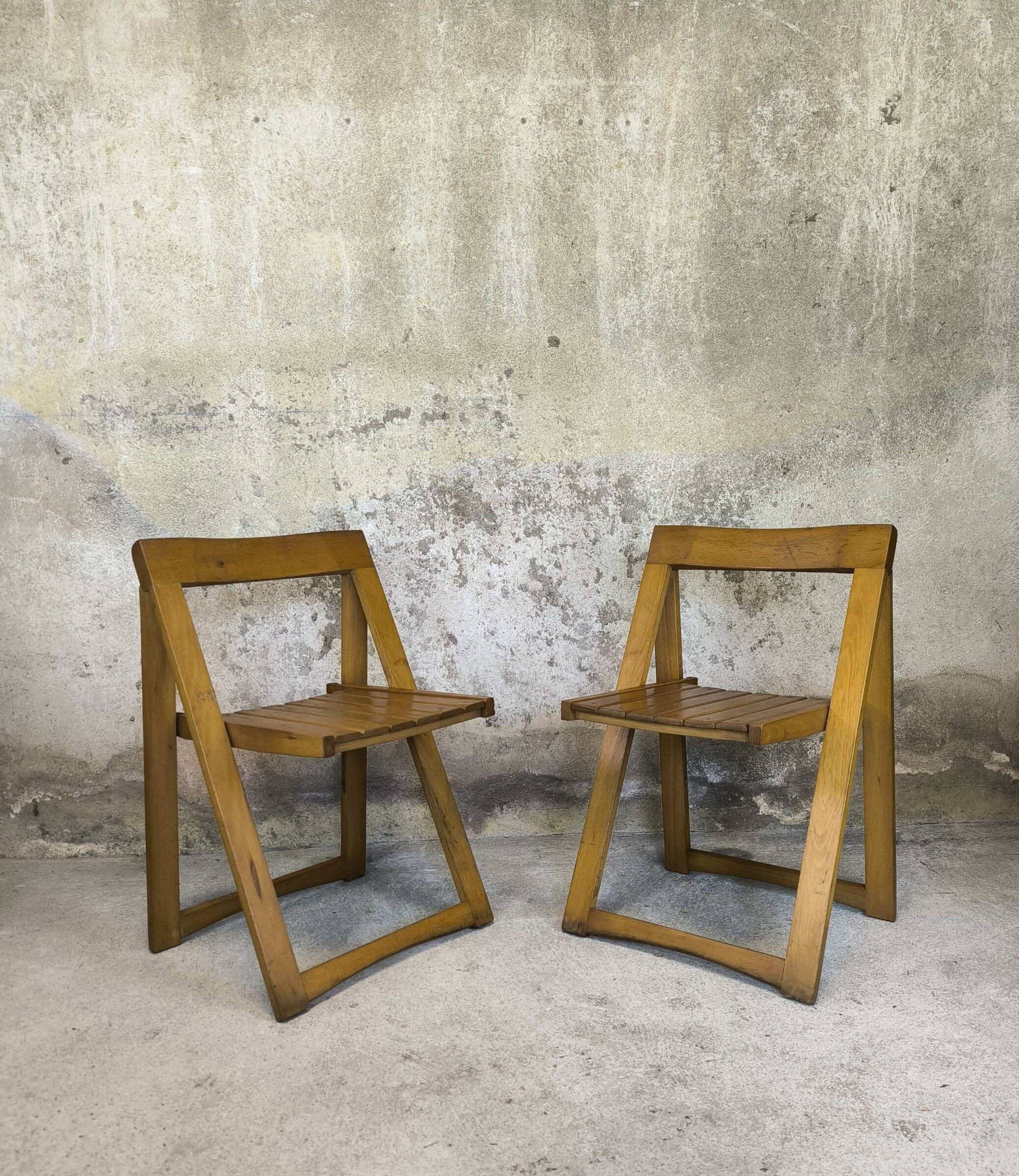 Pair of vintage folding wooden chairs by Aldo Jacober