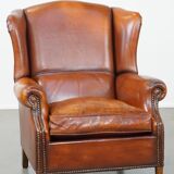Sheepskin leather wingback chair with patina