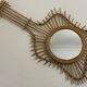 The vintage guitar rattan mirror.
